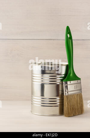 paint bucket and paintbrush  on wooden background Stock Photo