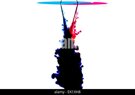 ink jet ink creating smoke swirls in water Stock Photo