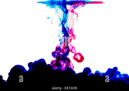 ink jet ink creating smoke swirls in water Stock Photo