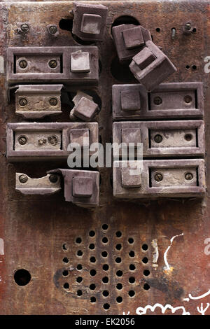 Rust intercom in close up on a brick wall Stock Photo