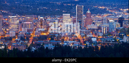 Downtown Portland Oregon city lights blue hour panorama. Stock Photo