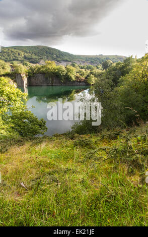 Looking across the disused Dorothea Slate Quarry, Nantlle, Gwynedd, Wales, United Kingdom. Flooded with water. Stock Photo