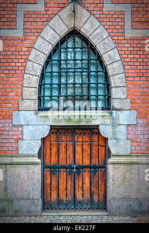 Wooden arched doors from the town hall building in Helsingborg, Sweden. Stock Photo