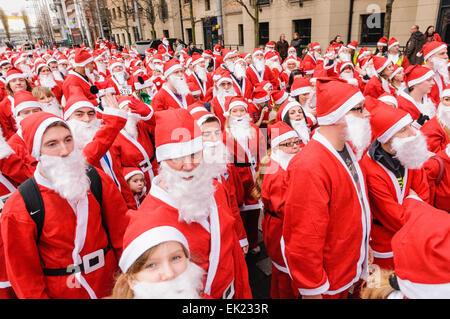 Belfast, Northern Ireland. 1st Dec 2013 - Cool FM's 'Santa Dash' raises cash for Cash For Kids and Barnardos charities Stock Photo