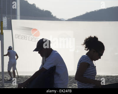 Rio De Janeiro, Brazil. 8th June, 2014. Silhouette of man and woman at beach, Copacabana, Rio De Janeiro, Brazil. © David H. Wells/ZUMA Wire/Alamy Live News Stock Photo