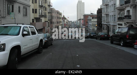 Grey sky morning view, to Cantonese shops, cars parked Stockton Street to balustrade above north portal tunnel, San Francisco Stock Photo