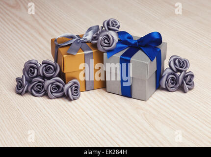 grey flowers and two gift boxes Stock Photo