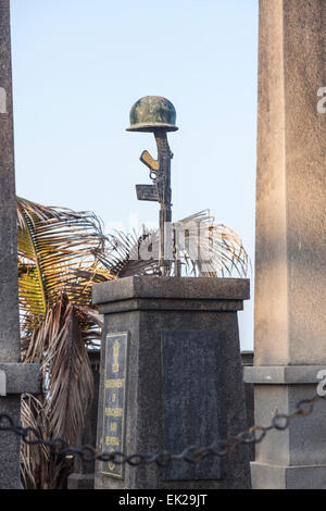 The iconic seafront Kargil War Memorial with rifle and helmet, Pondicherry, or Puducherry, Tamil Nadu, southern India Stock Photo