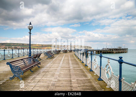 A Victorian seaside pier at Swanage a small town on Dorset's Jurassic Coat Stock Photo