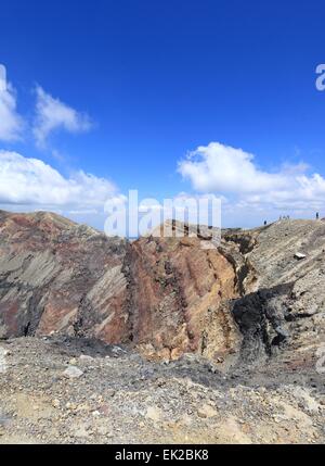 Hikers on the ridge of Volcano crater Stock Photo - Alamy