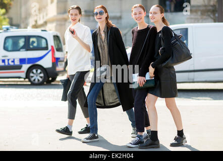 Paris Fashion Week - Spring/Summer 2015 - Streetstyle Featuring: Models Where: Paris, France When: 01 Oct 2014 Stock Photo