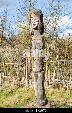 SENOREN, SWEDEN - APRIL 3, 2015: Fertility totem statue of woman carved by hand and made of oak. Part of viking age village repl Stock Photo