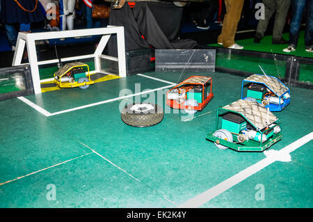 Playing football with remote controlled robots Stock Photo