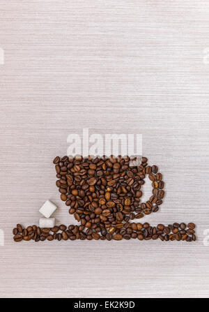 Coffee beans in a cup and sugar Stock Photo