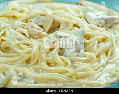Spaghetti with chicken in a creamy sauce Stock Photo
