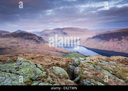 Dusk from the summit of Middle Fell view of Yewbarrow, Wastwater, Scafell Pike and Scafell in the English Lake District Stock Photo
