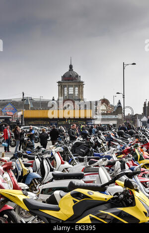 Southend on Sea, UK. 6th April, 2015. Monday 6th April, 2015.  Southend on Sea.  Motor bikes parked in front of the iconic Kursaal during the Southend Shakedown. This Easter Bank Holiday over 10,000 motorbikes, scooters and trikes converged on Southend in Essex.  This event is a great way to dust off those winter blues, rev up and join Ace Cafe London’s first major ride out of the year. Credit:  Gordon Scammell/Alamy Live News Stock Photo