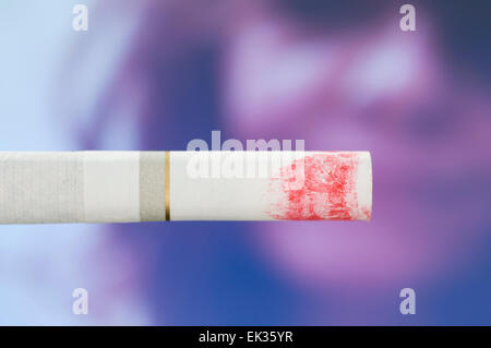 Cigarette with mark of lipstick Stock Photo