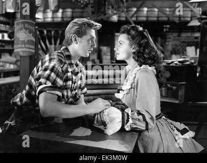 Lloyd Bridges, Rhonda Fleming, on-set of the Film 'Abilene Town', 1946 Stock Photo
