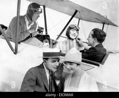 Dorothy Mackaill Jack Mulhall (right in plane) William Collier Jr. Louise Brooks on-set of the Silent Film 'Just Another Stock Photo