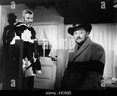 William Hopper, Robert Mitchum, on-set of the Film 'Track of the Cat', 1954 Stock Photo