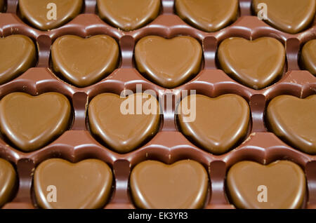 Heart shaped chocolate candies in a box Stock Photo