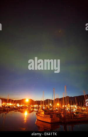 Aurora Borealis over the Seward Boat Harbor, Resurrection Bay, Seward, Alaska. Stock Photo