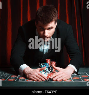 man playing at the casino Stock Photo