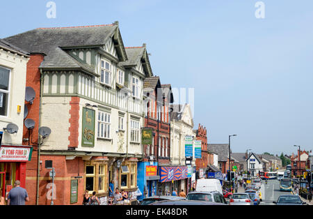 Main street of a typical busy English town, in summer; small town England; UK; small British town; town centre; townscape Stock Photo