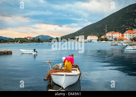 Fisherman prepairing for hunting Stock Photo