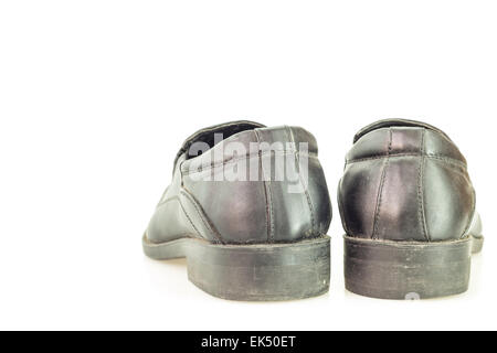 Old black man's shoes isolated on white background Stock Photo