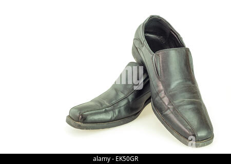 Old black man's shoes isolated on white background Stock Photo