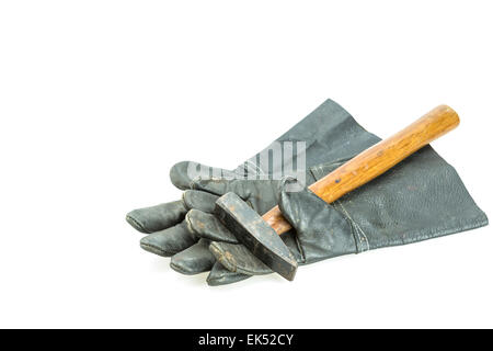 Black safety work glove and hammer isolated on white background Stock Photo
