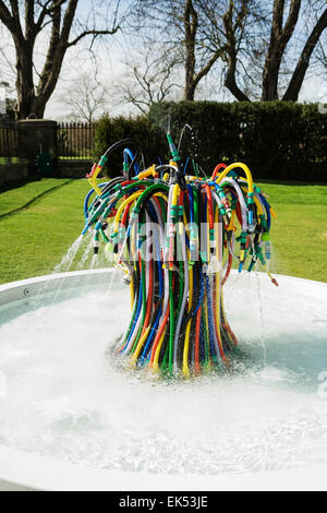 Hosepipe sculpture: Bertrand Lavier fountain, Serpentine Sackler Gallery, London, UK. Garden art. Water shortage concept Stock Photo
