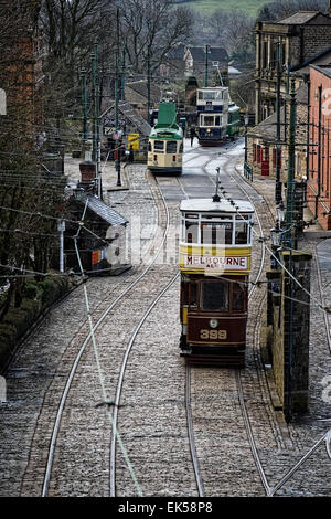 Tram 399: Leeds 1926; moves towards the village terminus where a driver enters Tram 345: Leeds 1921 Stock Photo