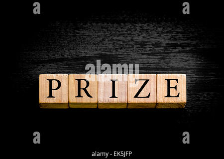 Word PRIZE. Wooden small cubes with letters isolated on white ...