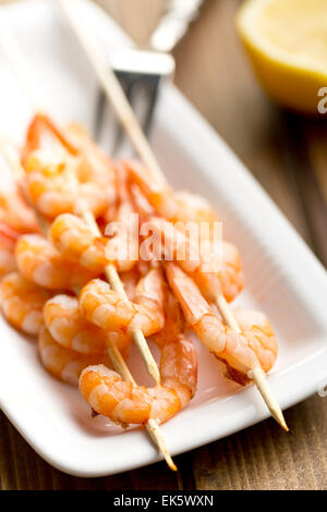grilled prawns on a plate Stock Photo