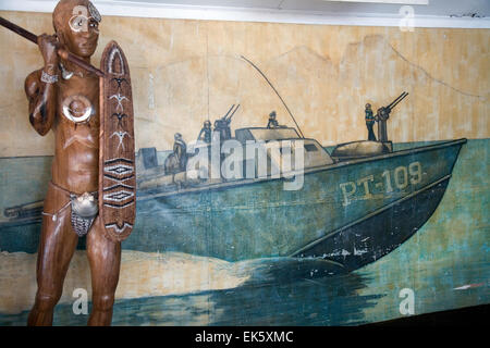 Mural and sculpture at the legendary PT-109 Bar & Restaurant in town of Gizo, Ghizo Island, Solomon Islands. Stock Photo