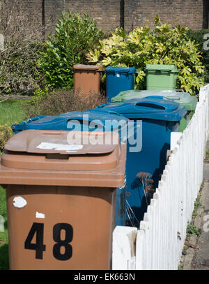 Domestic refuse bins in front gardens Stock Photo