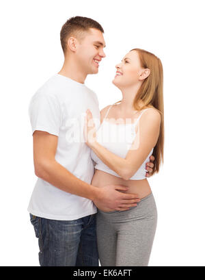 happy young family expecting child Stock Photo