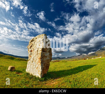 Stone against the beautiful sky with clouds. summer sunset in Crimea Stock Photo