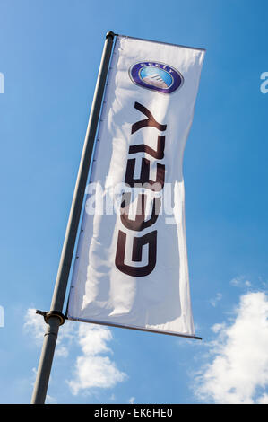 The flag of Geely over blue sky Stock Photo - Alamy