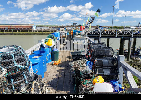 Lobster pots and fishing equipment in Newhaven Harbour East Sussex England United Kingdom UK Stock Photo