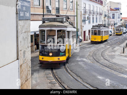 LISBON PORTUGAL THREE OLD TRAMS ON A HILL  IN THE CENTRE OF THE CITY Stock Photo