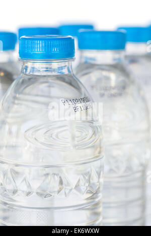 Drinking water bottle with expiration date isolated on white background ...