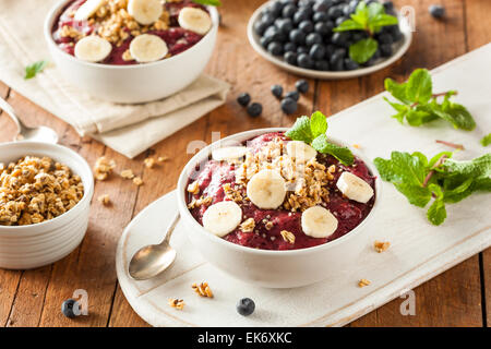 Healthy Organic Berry Smoothie Bowl with Granola and Fruit Stock Photo