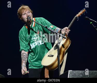 Ed Sheeran performs at 3Arena in Dublin wearing an Irish football jersey Featuring: Ed Sheeran Where: Dublin, Ireland When: 03 Oct 2014 Stock Photo