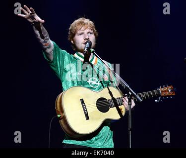 Ed Sheeran performs at 3Arena in Dublin wearing an Irish football jersey Featuring: Ed Sheeran Where: Dublin, Ireland When: 03 Oct 2014 Stock Photo