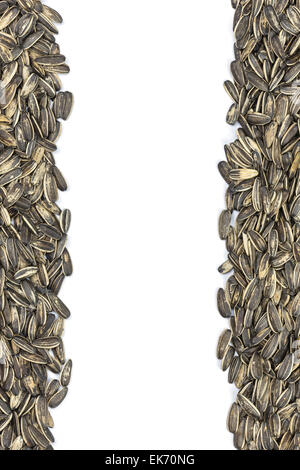 Sunflower seeds isolated on white background Stock Photo - Alamy
