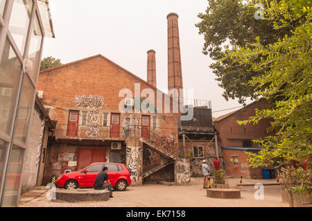 Art graffiti in Beijing Dashanzi Art District which houses an artistic community, among 50-year old factory buildings of unique Stock Photo